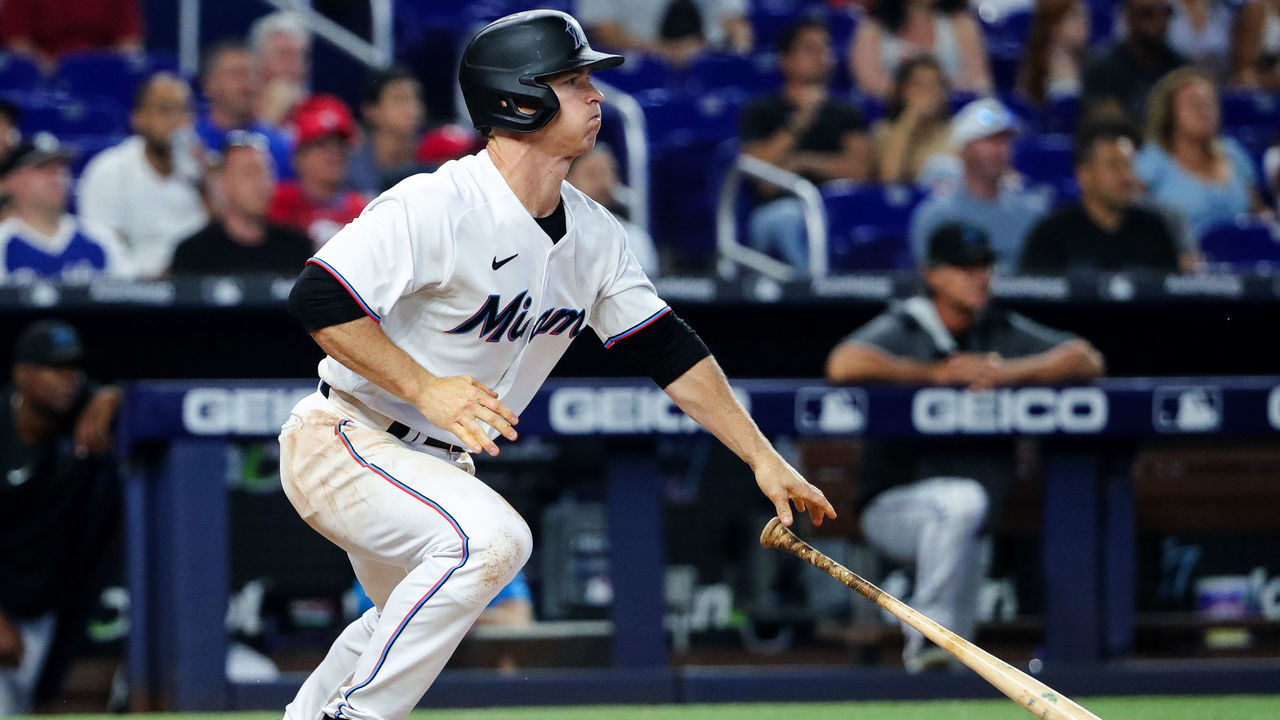 MIAMI, FLORIDA - APRIL 17: Joey Wendle #18 of the Miami Marlins hits an RBI single in the fourth inning against the Philadelphia Phillies at loanDepot park on April 17, 2022 in Miami, Florida.