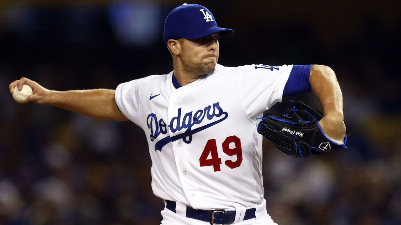 LOS ANGELES, CALIFORNIA - APRIL 14: Blake Treinen #49 of the Los Angeles Dodgers throws against the Cincinnati Reds in the eighth inning during the opening series at Dodger Stadium on April 14, 2022 in Los Angeles, California.