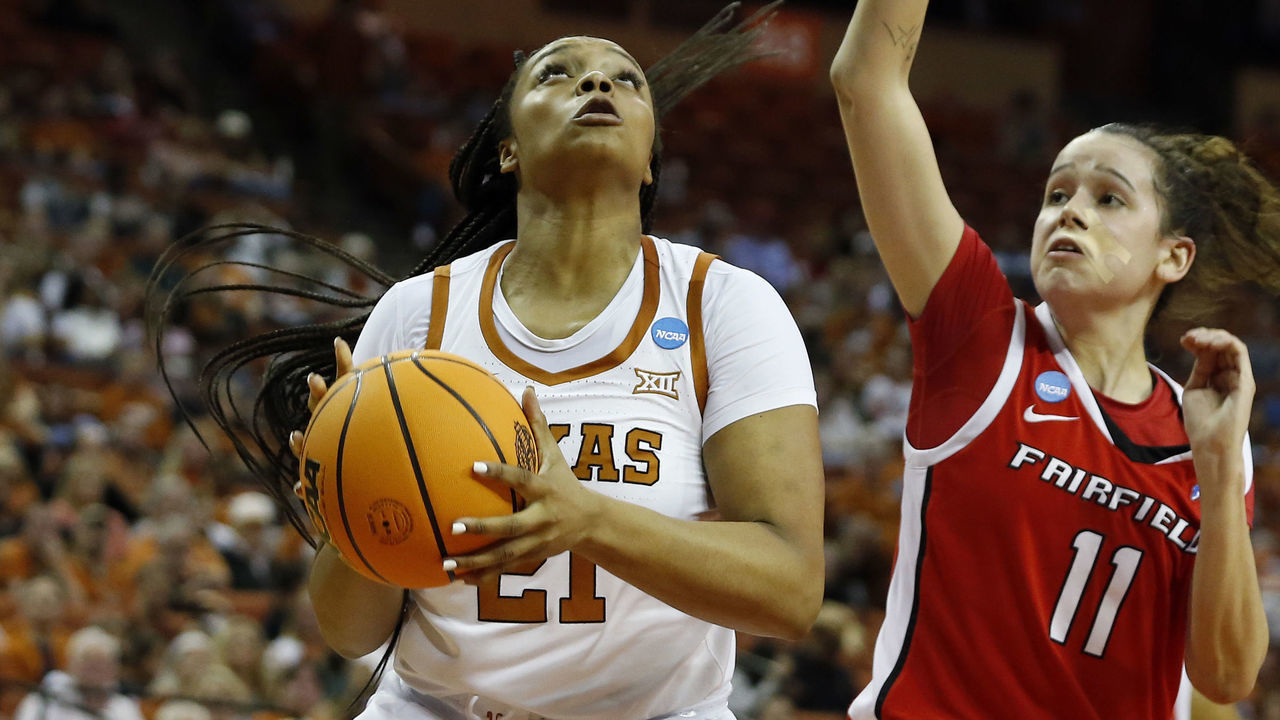 AUSTIN, TX - MARCH 18: Texas Longhorn forward Aaliyah Moore (21) takes a shot over Fairfield Stags forward Lou Lopez - Senechal (11) during the first round game of the 2022 NCAA Womens Basketball Tournament at the Frank Erwin Center in Austin, TX on March 18,2022.