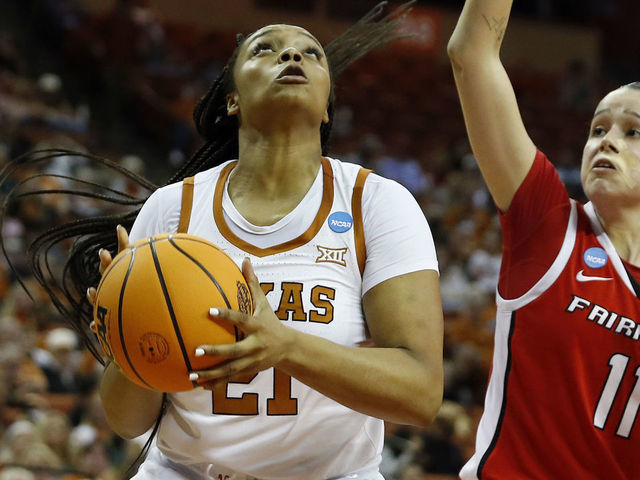 AUSTIN, TX - MARCH 18: Texas Longhorn forward Aaliyah Moore (21) takes a shot over Fairfield Stags forward Lou Lopez - Senechal (11) during the first round game of the 2022 NCAA Womens Basketball Tournament at the Frank Erwin Center in Austin, TX on March 18,2022.