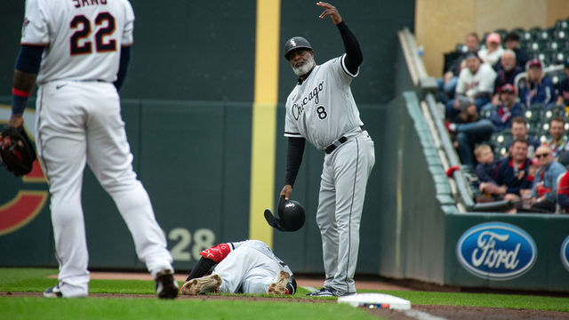 MINNEAPOLIS, MN - APRIL 23: Chicago White Sox left fielder Eloy Jimenez (74) gets hurt at first base in the 2nd inning during the MLB game between the Chicago White Sox and the Minnesota Twins on April 23nd, 2022, at Target Field in Minneapolis, MN.(