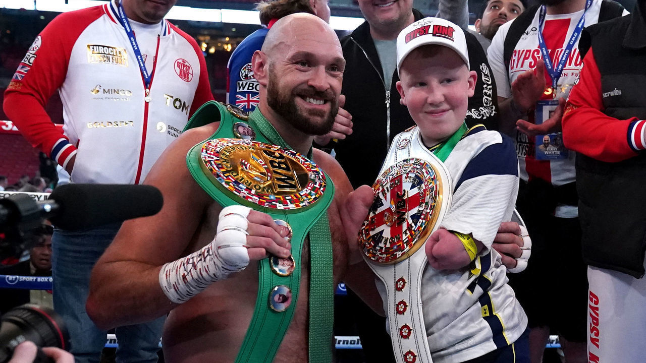 Tyson Fury speaks with Marshall Janson following victory over Dillian Whyte at Wembley Stadium, London. Picture date: Saturday April 23, 2022.