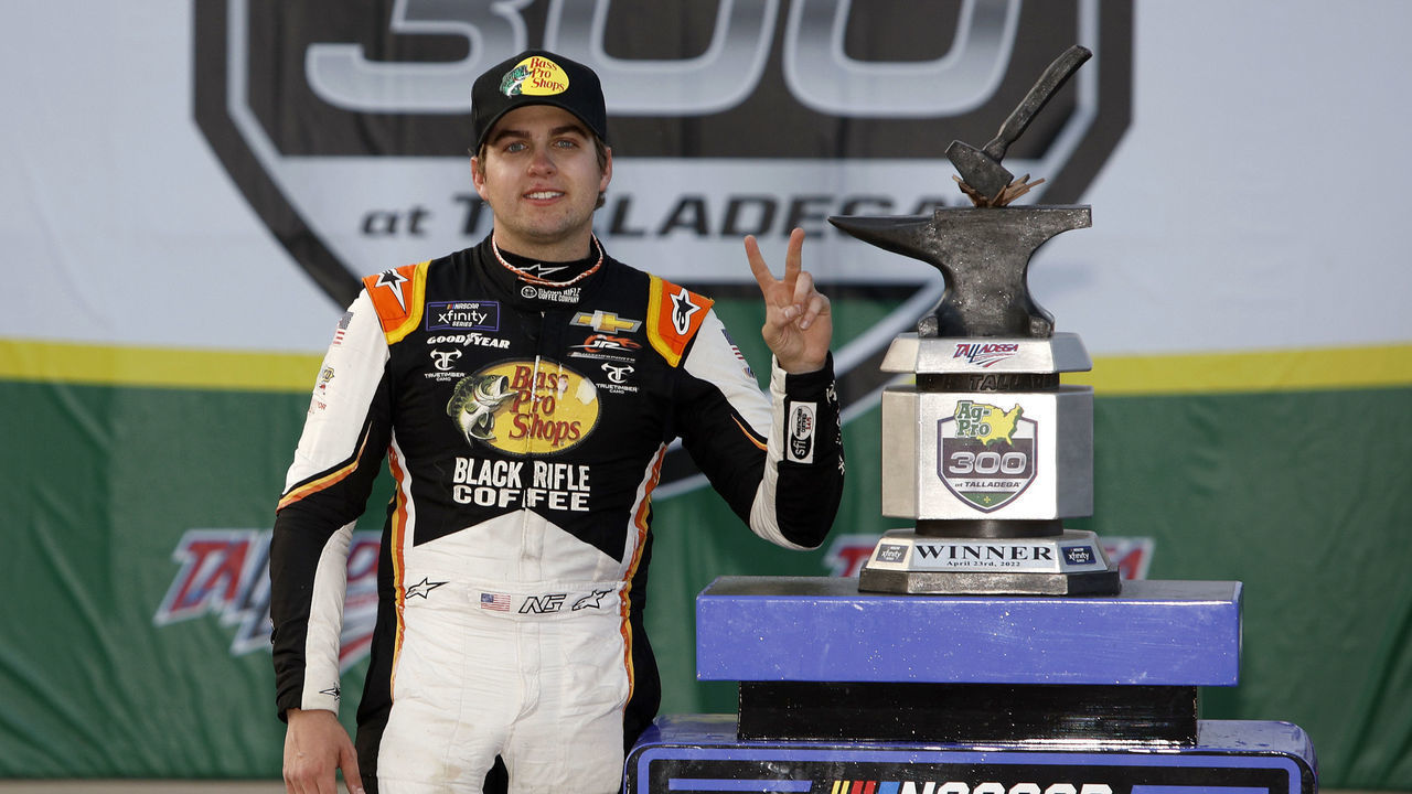 TALLADEGA, ALABAMA - APRIL 23: Noah Gragson, driver of the #9 Bass Pro Shops/TrueTimber/BRCC Chevrolet, celebrates in victory lane after winning the NASCAR Xfinity Series Ag-Pro 300 at Talladega Superspeedway on April 23, 2022 in Talladega, Alabama.