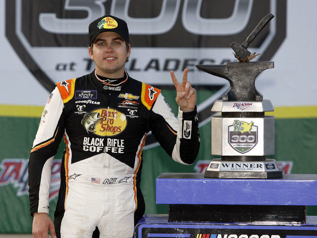 TALLADEGA, ALABAMA - APRIL 23: Noah Gragson, driver of the #9 Bass Pro Shops/TrueTimber/BRCC Chevrolet, celebrates in victory lane after winning the NASCAR Xfinity Series Ag-Pro 300 at Talladega Superspeedway on April 23, 2022 in Talladega, Alabama.