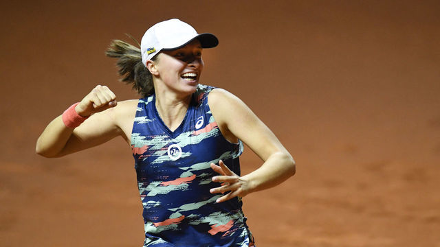 Polands Iga Swiatek celebrates winning the single's final match against Belarus Aryna Sabalenka (not in the picture) of the Women's Tennis Grand Prix WTA 500 tournament in Stuttgart, southwestern Germany, on April 24, 2022.