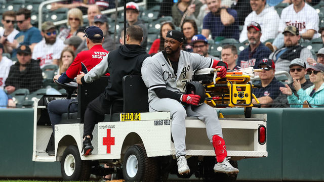 MINNEAPOLIS, MN - APRIL 23: Eloy Jimenez #74 of the Chicago White Sox is carted off the field after getting injured running to first base against the Minnesota Twins in the second inning of the game at Target Field on April 23, 2022 in Minneapolis, Minnesota.