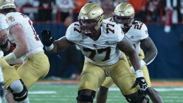 SYRACUSE, NY - OCTOBER 30: Boston College Eagles Offensive Lineman Zion Johnson (77) looks to block during the second half of the College Football game between the Boston College Eagles and the Syracuse Orange on October 30, 2021, at the Carrier Dome in Syracuse, NY.