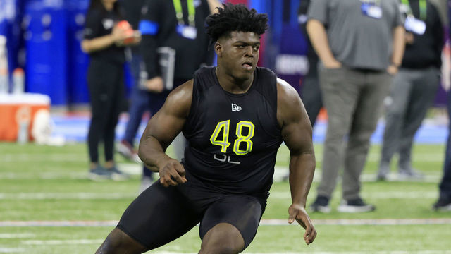 INDIANAPOLIS, INDIANA - MARCH 04: Tyler Smith #OL48 of Tulsa runs a drill during the NFL Combine at Lucas Oil Stadium on March 04, 2022 in Indianapolis, Indiana.