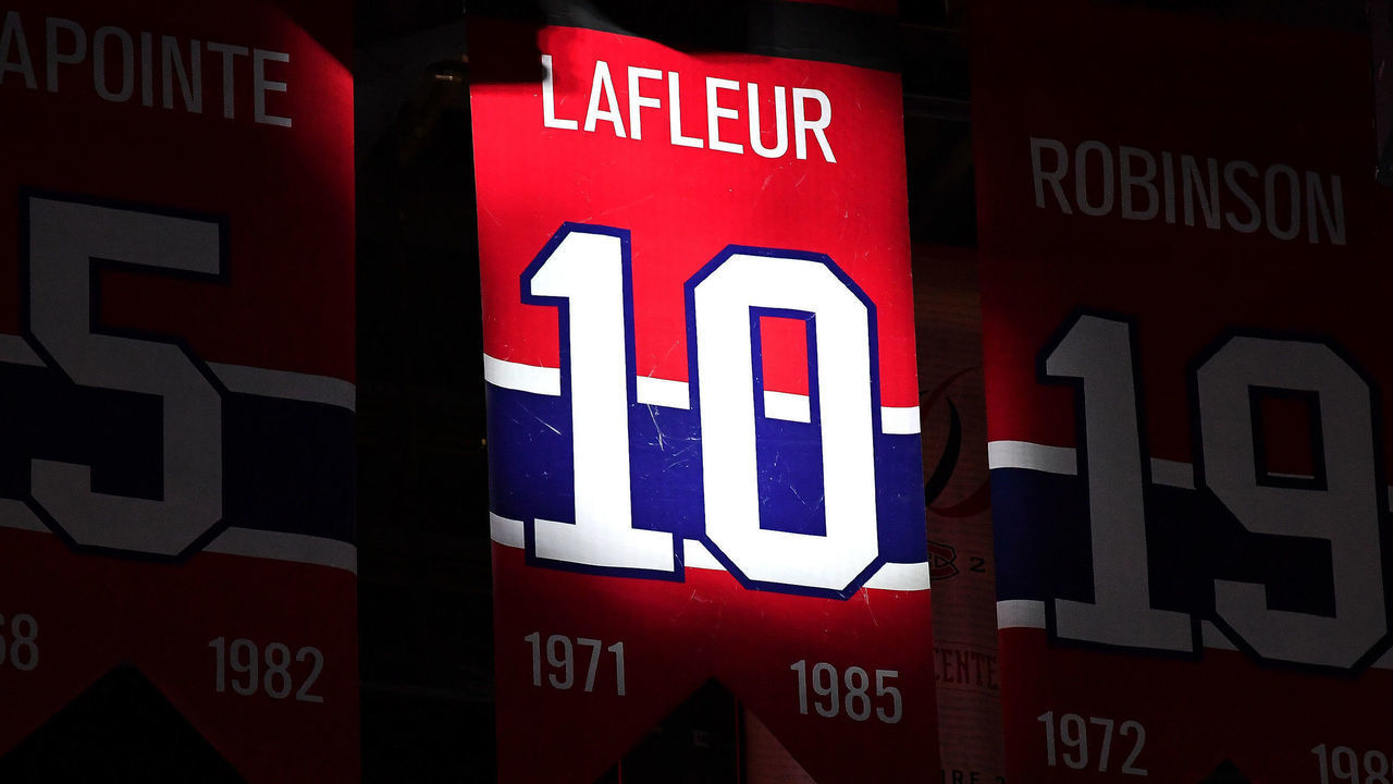 MONTREAL, QC - APRIL 24: No. 10 is spot-lit to honor Guy Lafleur after him passing away on April 22, 2022 at the age of 70 due to a battle with lung cancer, prior to the game between the Montreal Canadiens and the Boston Bruins at the Bell Centre on April 24, 2022 in Montreal, Quebec, Canada.