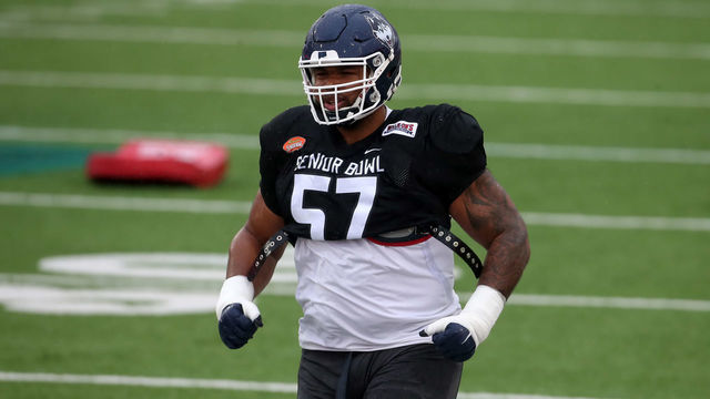 MOBILE, AL - FEBRUARY 02: National defensive lineman Travis Jones of Connecticut (57) during the Reese's Senior Bowl practice session on February 2, 2002 at Hancock Whitney Stadium in Mobile, Alabama.