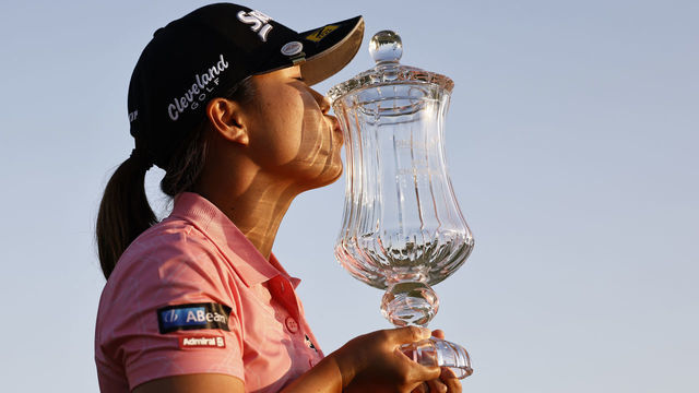 LOS ANGELES, CALIFORNIA - APRIL 24: Nasa Hataoka of Japan poses for the media with DIO Implant LA Open Trophy after winning in the final round of the DIO Implant LA Open at Wilshire Country Club on April 24, 2022 in Los Angeles, California.