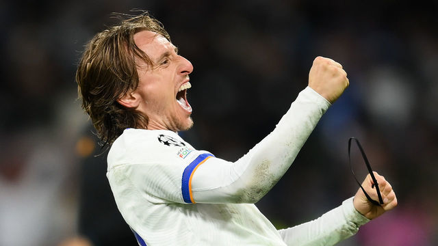 MADRID, SPAIN - APRIL 12: Luka Modric of Real Madrid CF celebrates at the end of the UEFA Champions League Quarter Final Leg Two match between Real Madrid and Chelsea FC at Estadio Santiago Bernabeu on April 12, 2022 in Madrid, Spain.