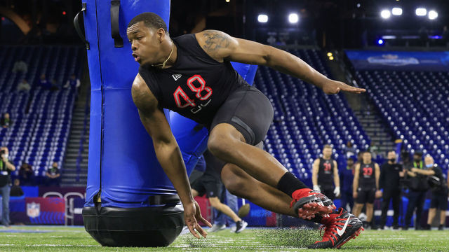 INDIANAPOLIS, INDIANA - MARCH 05: Travon Walker #DL48 of the Georgia Bulldogs runs a drill during the NFL Combine at Lucas Oil Stadium on March 05, 2022 in Indianapolis, Indiana.