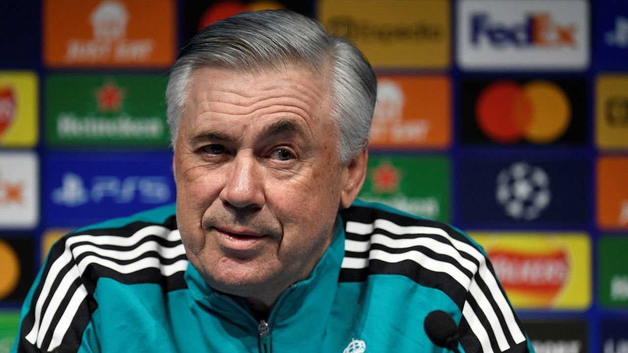 Real Madrid's Italian coach Carlo Ancelotti reacts as he speaks during a press conference at the Etihad Stadium in Manchester, north west England, on April 25, 2022, on the eve of their UEFA Champions League semi-final first leg football match against Manchester City.