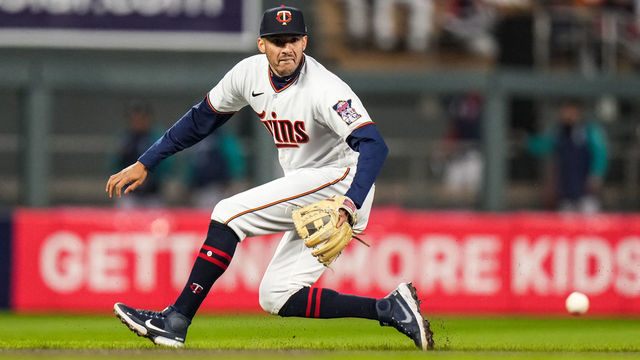 MINNEAPOLIS, MN - APRIL 11: Carlos Correa #4 of the Minnesota Twins fields against the Seattle Mariners on April 11, 2022 at Target Field in Minneapolis, Minnesota.