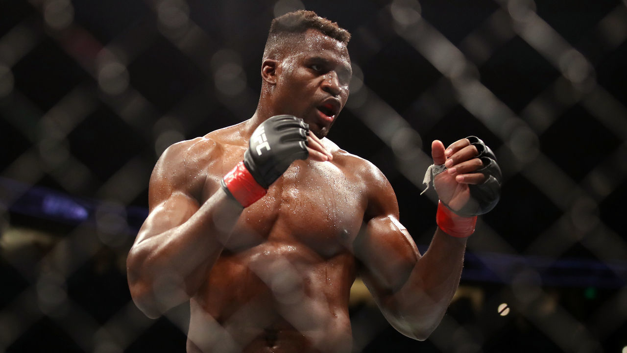 ANAHEIM, CALIFORNIA - JANUARY 22: Francis Ngannou of Cameroon looks on against Ciryl Gane of France in their heavyweight title fight during the UFC 270 event at Honda Center on January 22, 2022 in Anaheim, California.