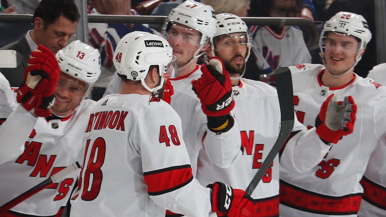 NEW YORK, NY - APRIL 26: Jordan Martinook #48 of the Carolina Hurricanes celebrates with teammates after scoring a goal in the second period against the New York Rangers at Madison Square Garden on April 26, 2022 in New York City.