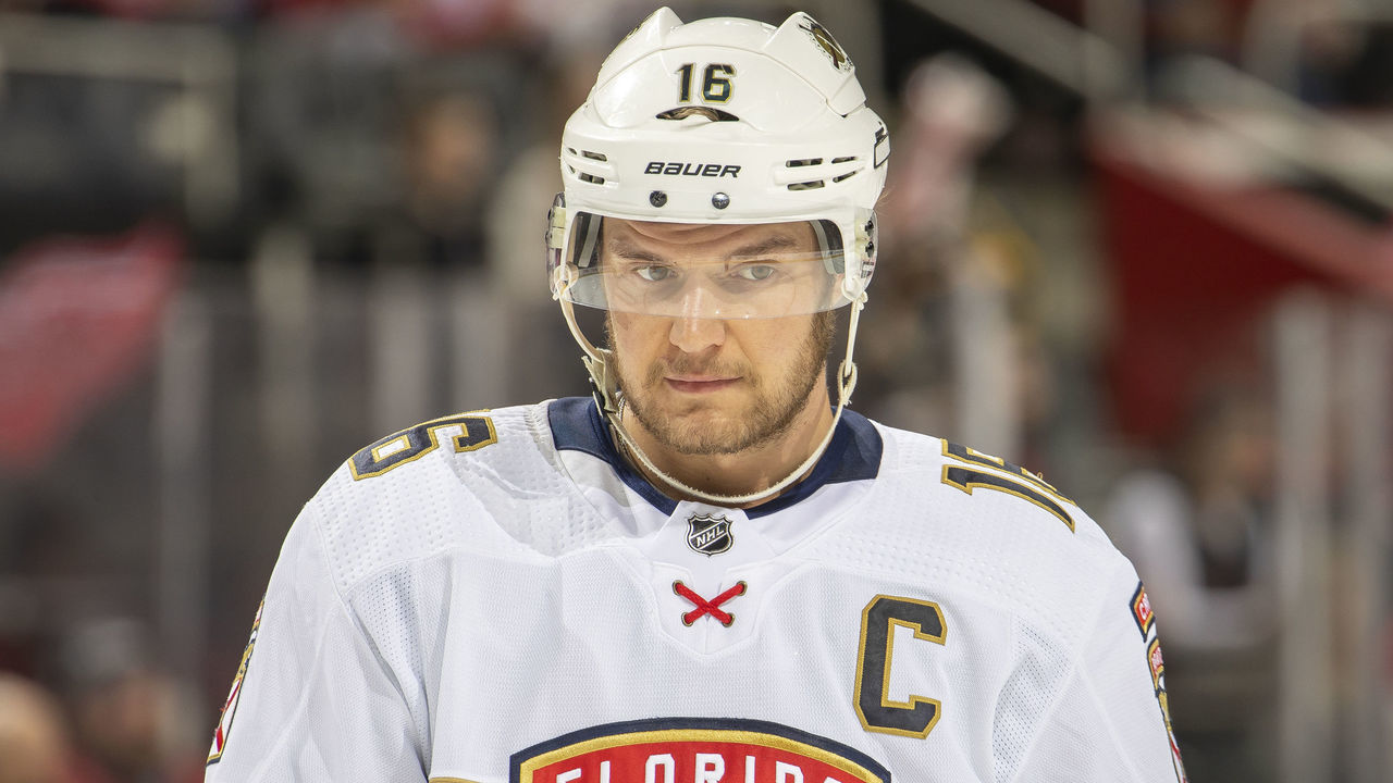DETROIT, MI - APRIL 17: Aleksander Barkov #16 of the Florida Panthers gets set for the face-off against the Detroit Red Wings during the first period of an NHL game at Little Caesars Arena on April 17, 2022 in Detroit, Michigan. Florida defeated Detroit 6-1.