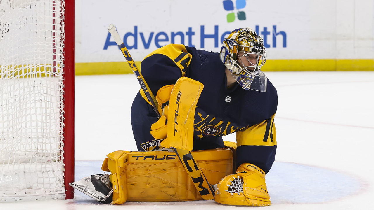TAMPA, FL - APRIL 23: Goalie Juuse Saros #74 of the Nashville Predators makes a save against the Tampa Bay Lightning during the first period at Amalie Arena on April 23, 2022 in Tampa, Florida.