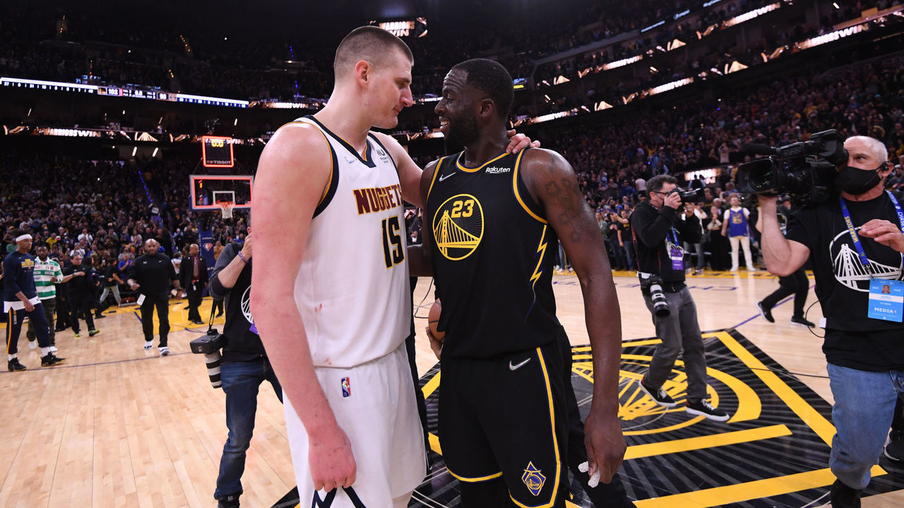 SAN FRANCISCO, CA - APRIL 27: Nikola Jokic #15 of the Denver Nuggets hugs Draymond Green #23 of the Golden State Warriors after Round 1 Game 5 of the 2022 NBA Playoffs on April 27, 2022 at Chase Center in San Francisco, California. NOTE TO USER: User expressly acknowledges and agrees that, by downloading and or using this photograph, user is consenting to the terms and conditions of Getty Images License Agreement. Mandatory Copyright Notice: Copyright 2022 NBAE