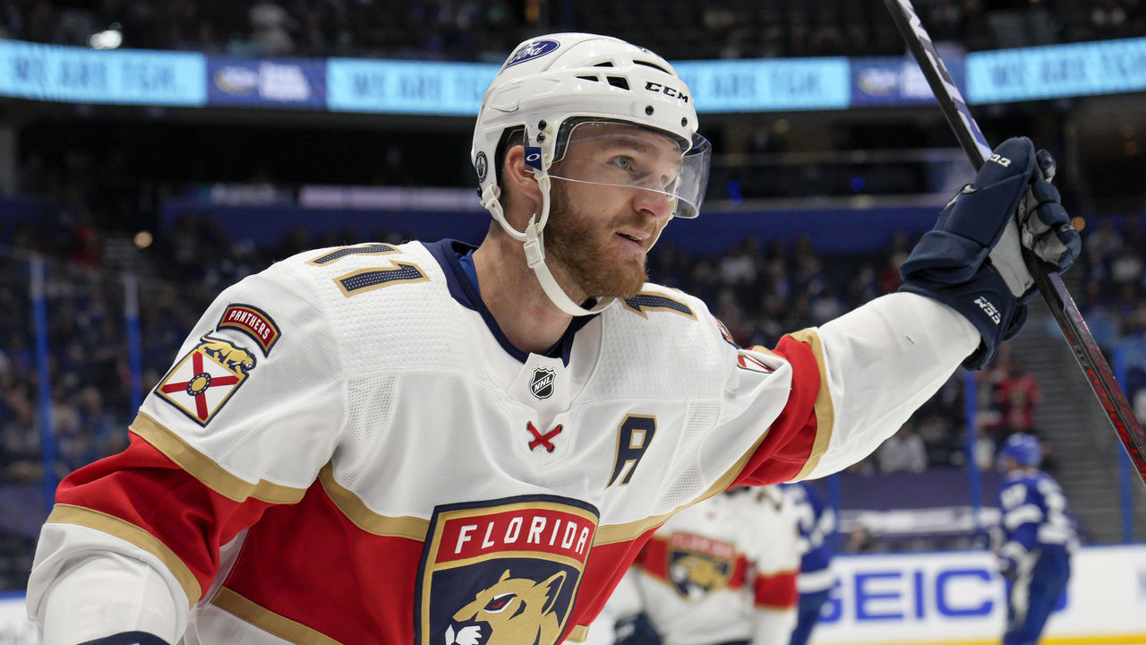 TAMPA, FL - MAY 22: Florida Panthers left wing Jonathan Huberdeau (11) celebrates scoring a goal during the NHL Hockey Stanley Cup playoff match between the Tampa Bay Lightning and Florida Panthers on May 22, 2021 at Amalie Arena in Tampa, FL.