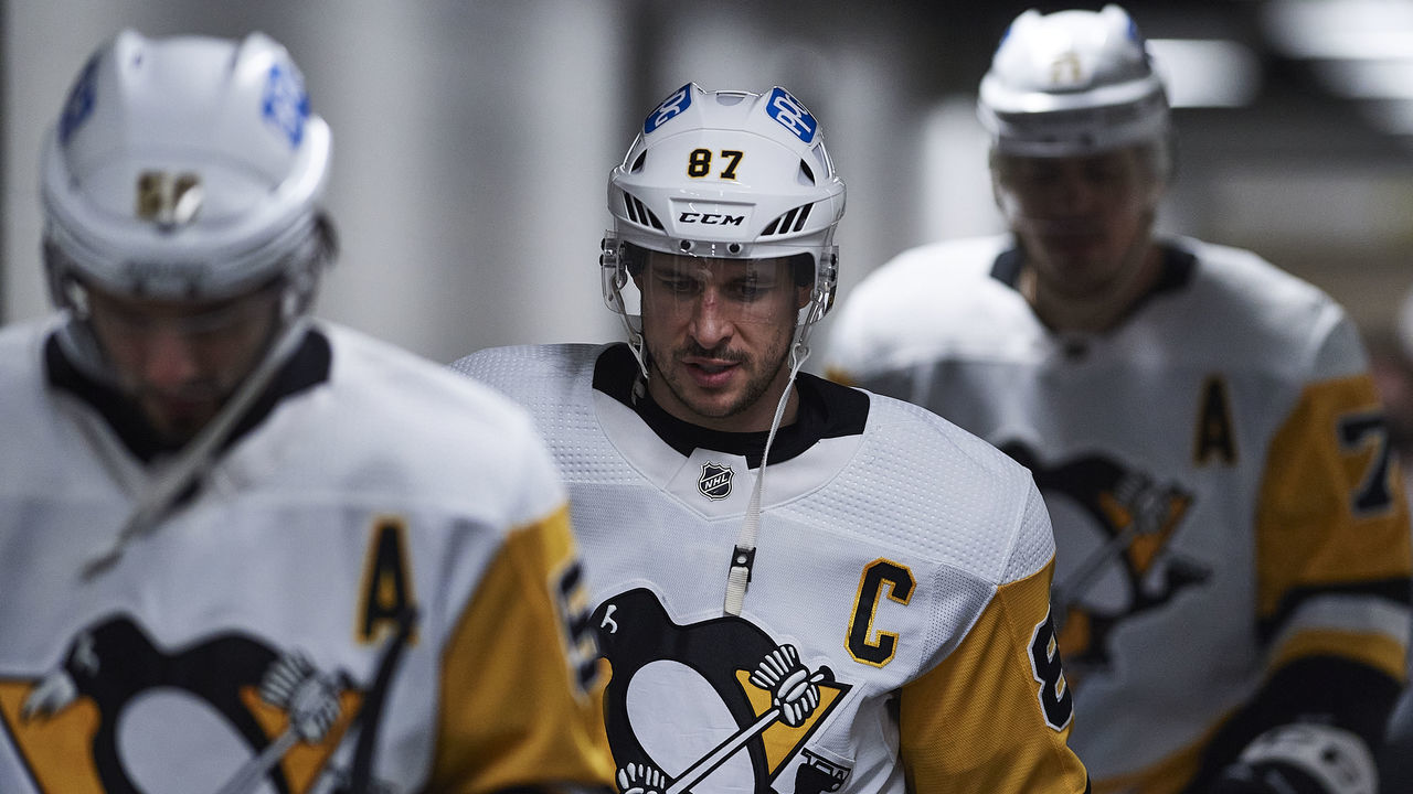SAN JOSE, CA - JANUARY 15: Pittsburgh Penguins center Sidney Crosby (87), Pittsburgh Penguins defenseman Kris Letang (58) and Pittsburgh Penguins center Evgeni Malkin (71) prepare to take the ice before the NHL game between the San Jose Sharks and the Pittsburgh Penguins on January 15, 2022 at SAP Center in San Jose, CA.