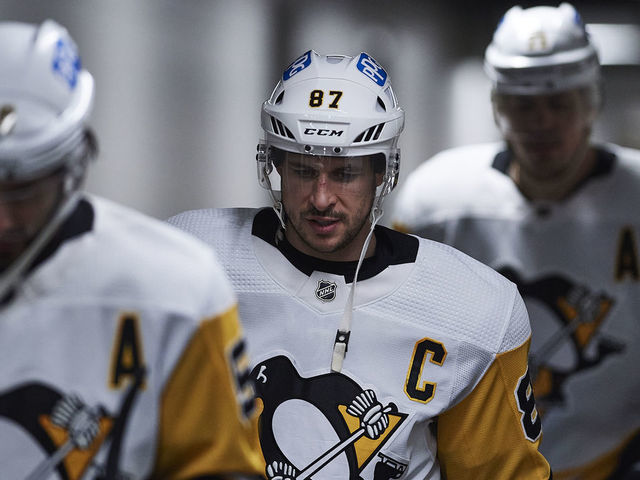 SAN JOSE, CA - JANUARY 15: Pittsburgh Penguins center Sidney Crosby (87), Pittsburgh Penguins defenseman Kris Letang (58) and Pittsburgh Penguins center Evgeni Malkin (71) prepare to take the ice before the NHL game between the San Jose Sharks and the Pittsburgh Penguins on January 15, 2022 at SAP Center in San Jose, CA.