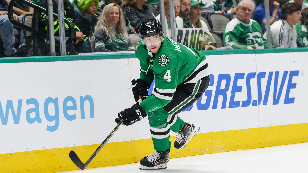 DALLAS, TX - APRIL 05: Dallas Stars defenseman Miro Heiskanen (4) chases the puck during the game between the Dallas Stars and the New York Islanders on April 5, 2022 at the American Airlines Center in Dallas, Texas.