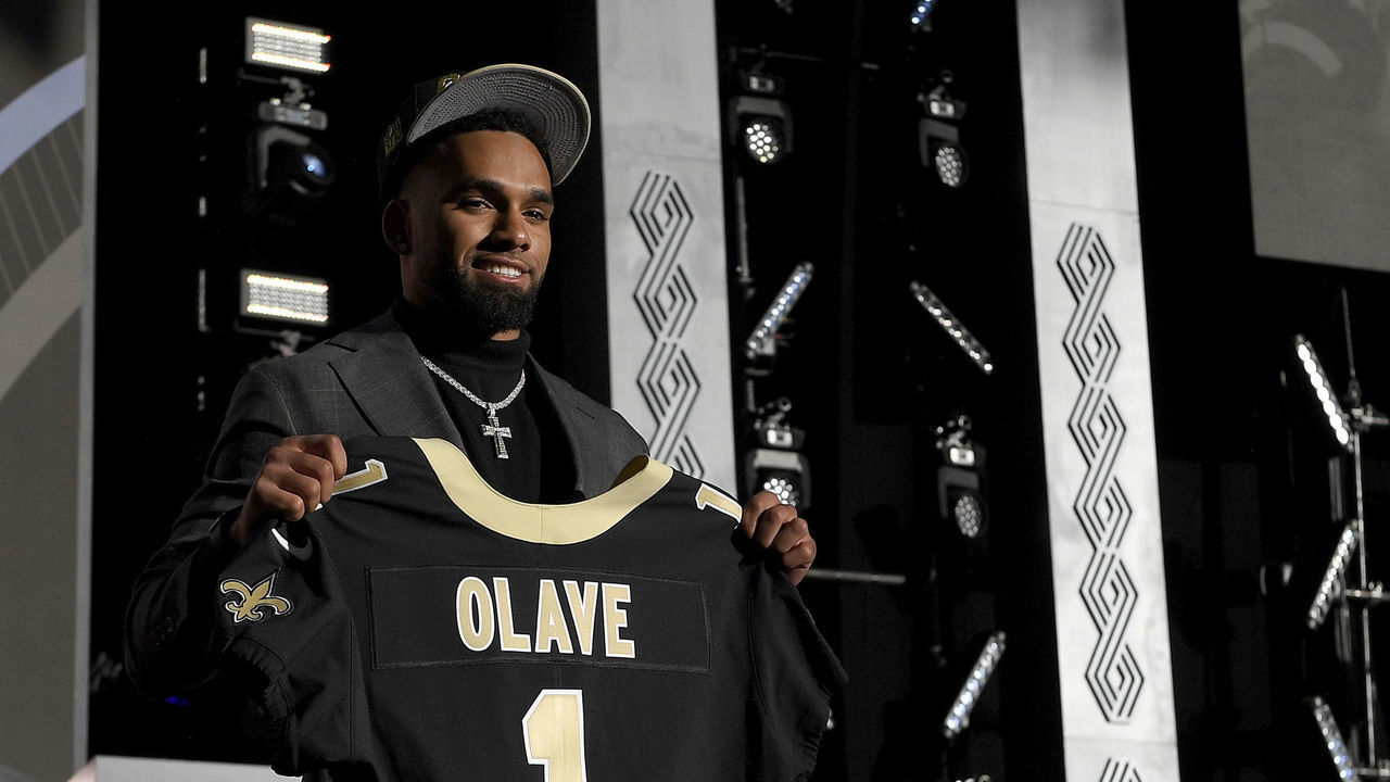 LAS VEGAS, NEVADA - APRIL 28: Chris Olave poses onstage after being selected 11th by the New Orleans Saints during round one of the 2022 NFL Draft on April 28, 2022 in Las Vegas, Nevada.