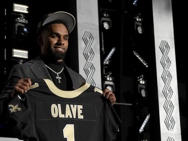 Saints trade up and draft Ohio State receiver Chris Olave - Canal