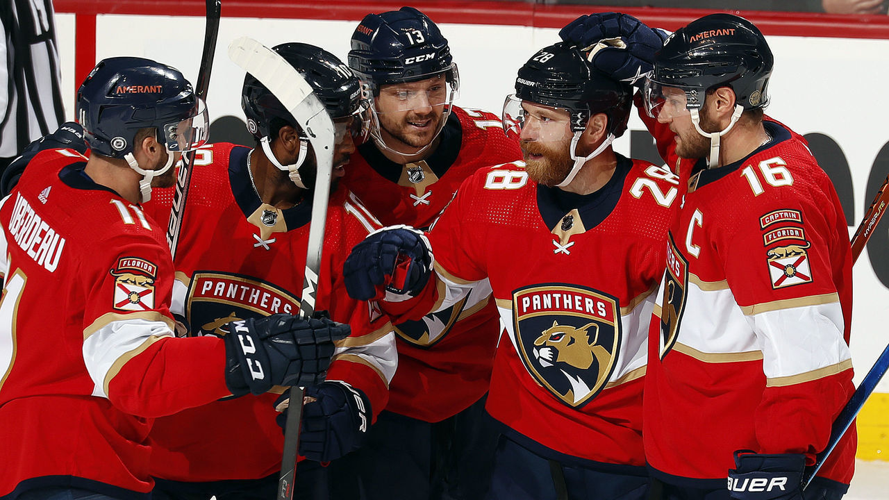 SUNRISE, FL - APRIL 24: Sam Reinhart #13 of the Florida Panthers celebrates his third quarter goal with teammates against the Tampa Bay Lightning at the FLA Live Arena on April 24, 2022 in Sunrise, Florida.