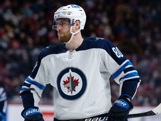 MONTREAL, QC - APRIL 11: Pierre-Luc Dubois (80) of the Winnipeg Jets waits for play to begin during the third period of the NHL game between the Winnipeg Jets and the Montreal Canadiens on April 11, 2022, at the Bell Centre in Montreal, QC