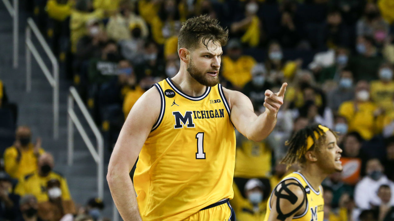 ANN ARBOR, MI - MARCH 01: Michigan Wolverines center Hunter Dickinson (1) gestures to the Michigan State bench as he runs up the court during a regular season Big Ten Conference basketball game between the Michigan State Spartans and the Michigan Wolverines on March 1, 2022 at Crisler Center in Ann Arbor, MI.