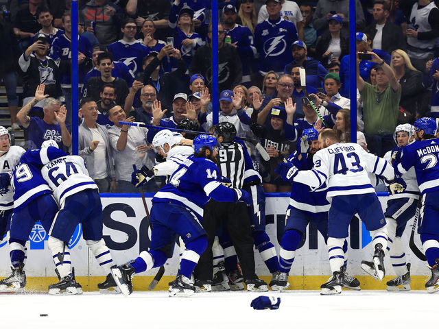 TAMPA, FLORIDA - APRIL 21: The Tampa Bay Lightning and the Toronto Maple Leafs fight in the third period during a game at Amalie Arena on April 21, 2022 in Tampa, Florida.