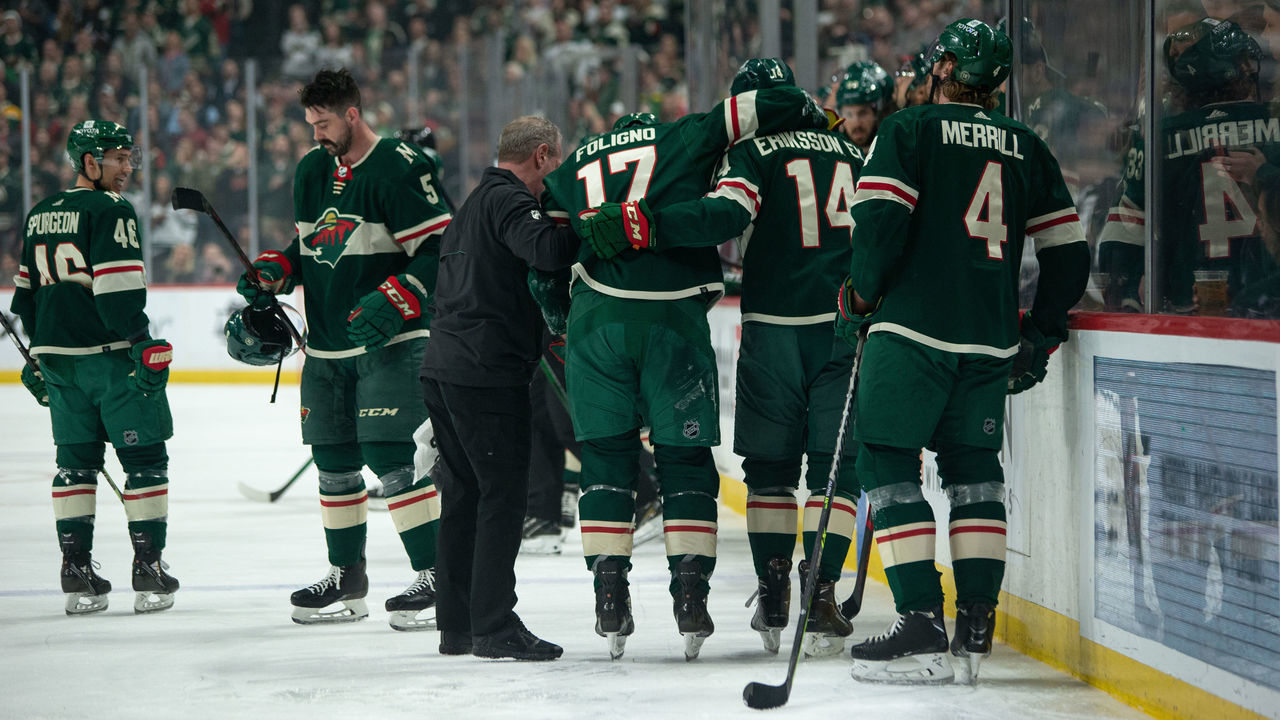 SAINT PAUL, MN - APRIL 29: Minnesota Wild Right Wing Marcus Foligno (17) is helped off the ice during the NHL game between the Colorado Avalanche and the Minnesota Wild on April 29th, 2022, at Xcel Energy Center in Saint Paul, MN.