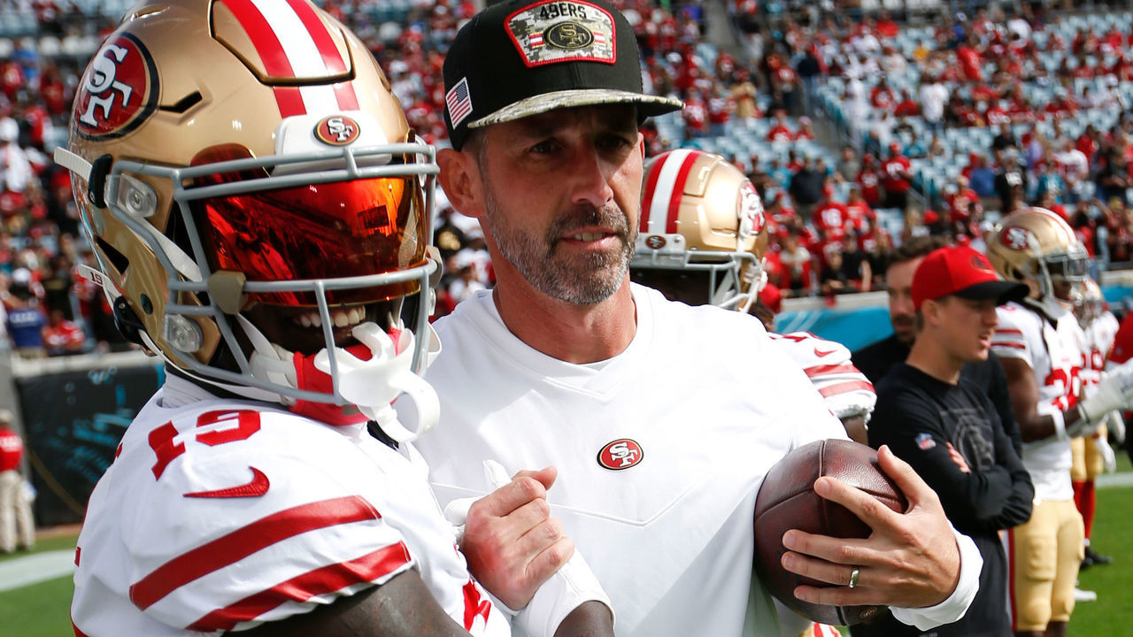 JACKSONVILLE, FL - NOVEMBER 21: Deebo Samuel #19 and Head Coach Kyle Shanahan of the San Francisco 49ers on the field before the game against the Jacksonville Jaguars at TIAA Bank Field on November 21, 2021 in Jacksonville, Florida. The 49ers defeated the Jaguars 30-10.
