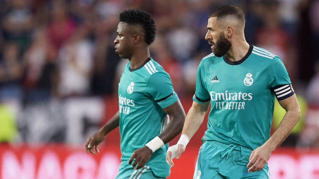 Karim Benzema and Vinicius Junior of Real Madrid during the LaLiga Santander match between Sevilla FC and Real Madrid CF at Estadio Ramon Sanchez Pizjuan on April 17, 2022 in Seville, Spain.
