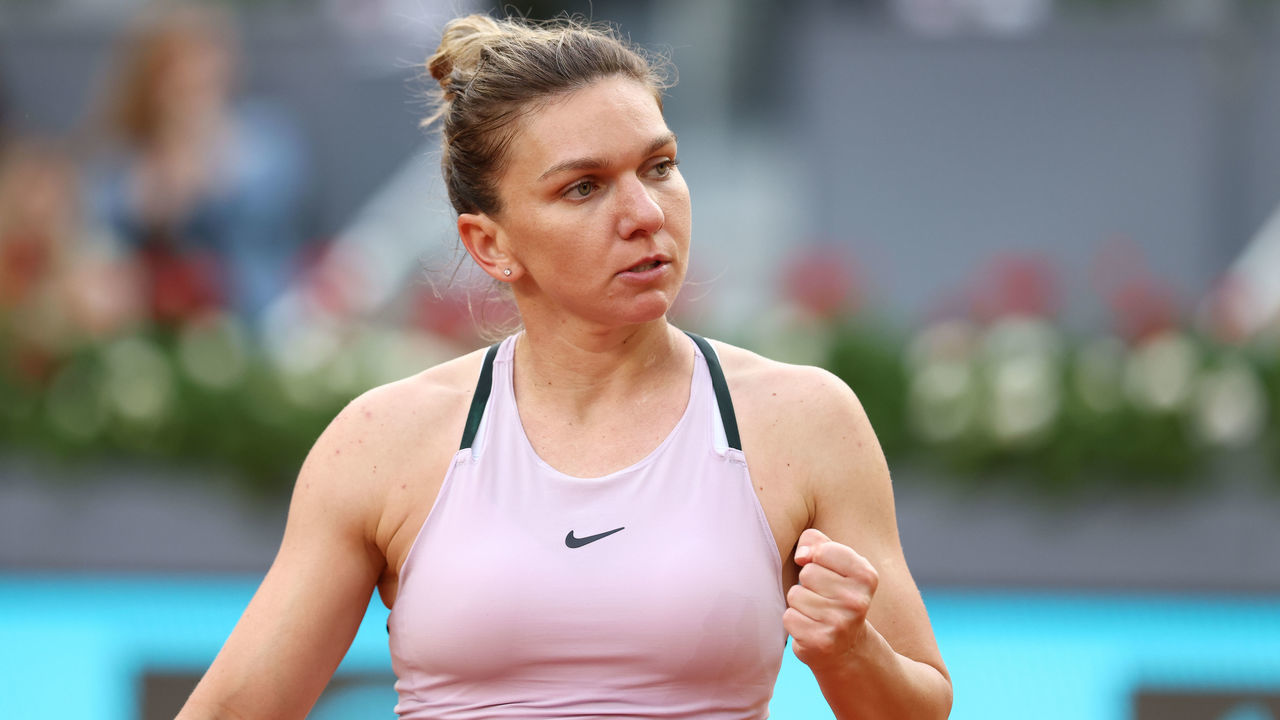 MADRID, SPAIN - APRIL 30: Simona Halep of Romania in action against Paula Badosa of Spain during the Mutua Madrid Open 2022 at La Caja Magica on April 30, 2022, in Madrid, Spain.