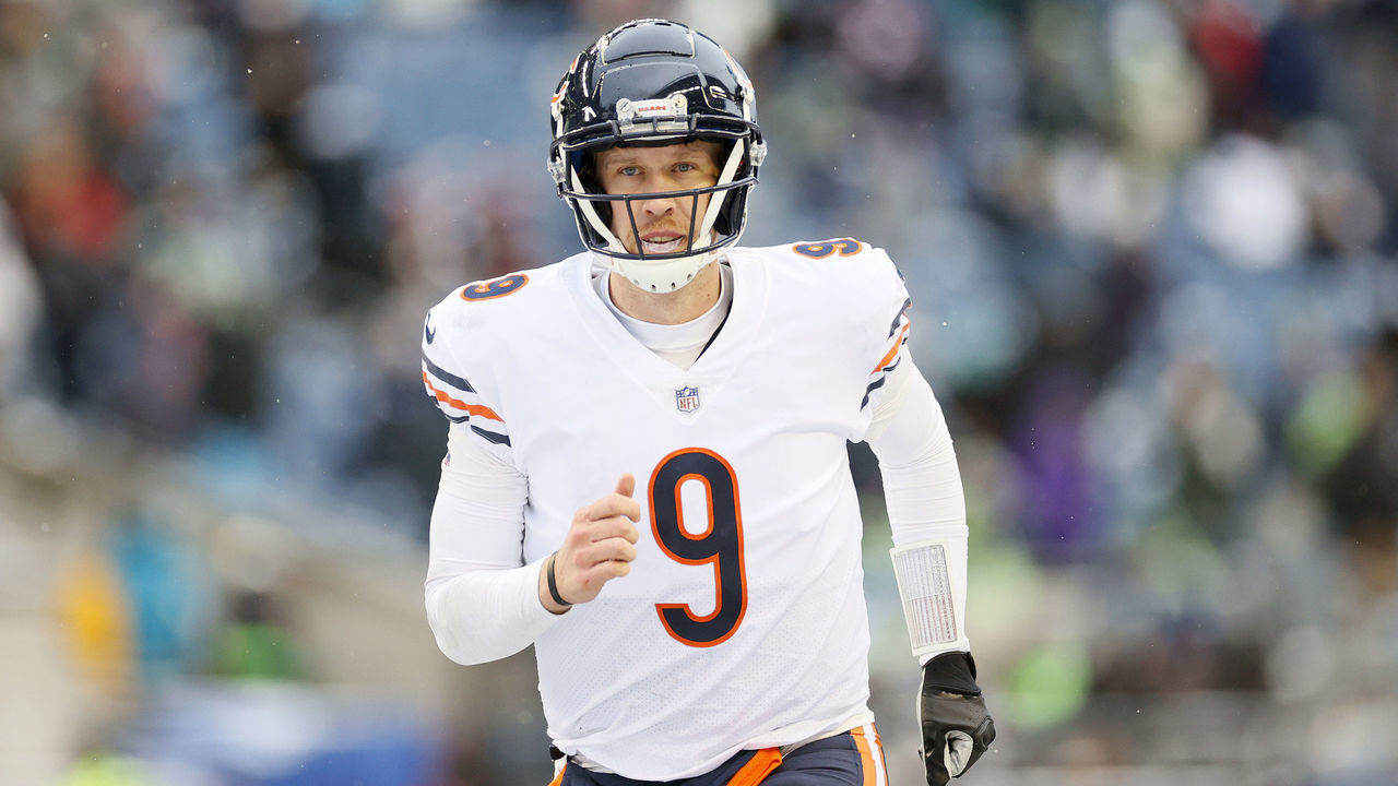 SEATTLE, WASHINGTON - DECEMBER 26: Nick Foles #9 of the Chicago Bears jogs off the field for halftime against the Seattle Seahawks at Lumen Field on December 26, 2021 in Seattle, Washington.