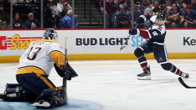 DENVER, COLORADO - APRIL 28: Mikko Rantanen #96 of the Colorado Avalanche shoots on goaltender David Rittich #33 of the Nashville Predators at Ball Arena on April 28, 2022 in Denver, Colorado.