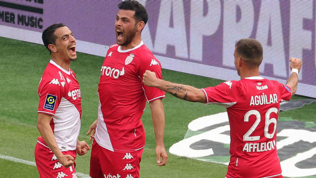 Monaco's French forward Wissam Ben Yedder (L) celebrates with Monaco's German forward Kevin Volland (C) after scoring a goal during the French L1 football match between AS Monaco and Angers SCO at "Louis II" stadium in Monaco, on May 01, 2022.