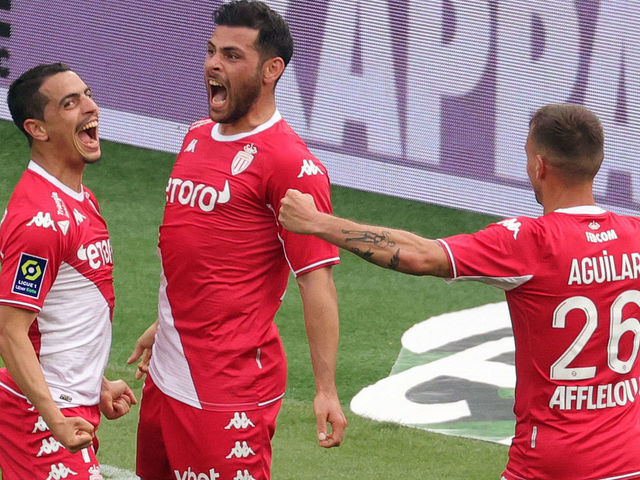 Monaco's French forward Wissam Ben Yedder (L) celebrates with Monaco's German forward Kevin Volland (C) after scoring a goal during the French L1 football match between AS Monaco and Angers SCO at "Louis II" stadium in Monaco, on May 01, 2022.