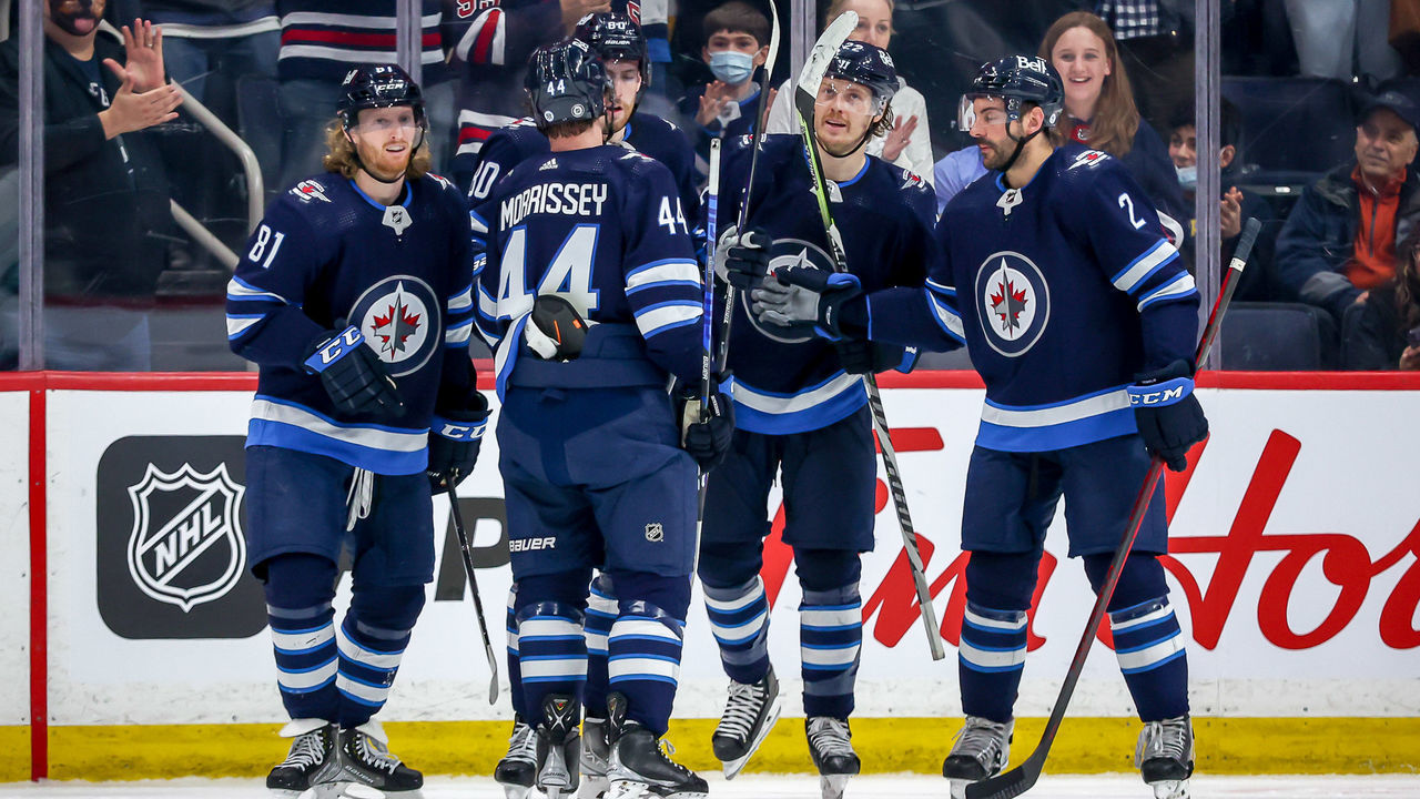 WINNIPEG, MB - MAY 1: Kyle Connor #81, Josh Morrissey #44, Pierre-Luc Dubois #80, Mason Appleton #22 and Dylan DeMelo #2 of the Winnipeg Jets celebrate a third period goal against the Seattle Kraken at the Canada Life Centre on May 1, 2022 in Winnipeg, Manitoba, Canada.