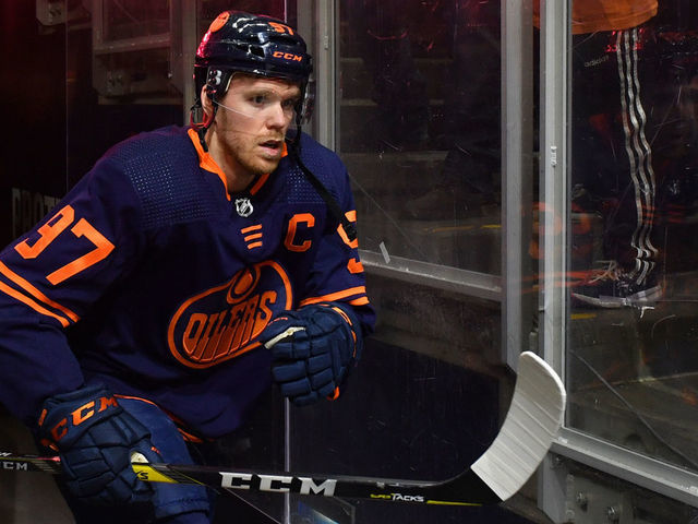 EDMONTON, AB - APRIL 28: Connor McDavid #97 of the Edmonton Oilers walks to the ice prior to the game against the San Jose Sharks on April 28, 2022 at Rogers Place in Edmonton, Alberta, Canada.