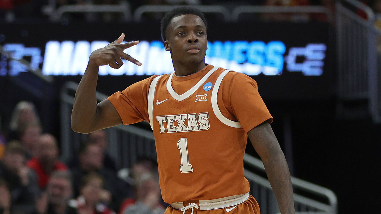 MILWAUKEE, WISCONSIN - MARCH 20: Andrew Jones #1 of the Texas Longhorns reacts after a 3-point basket during the second half against the Purdue Boilermakers in the second round of the 2022 NCAA Men's Basketball Tournament at Fiserv Forum on March 20, 2022 in Milwaukee, Wisconsin.