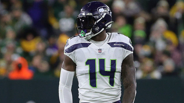 GREEN BAY, WISCONSIN - NOVEMBER 14: DK Metcalf #14 of the Seattle Seahawks waits for the snap during a game against the Green Bay Packers at Lambeau Field on November 14, 2021 in Green Bay, Wisconsin. The Packers defeated the Seahawks 17-0.