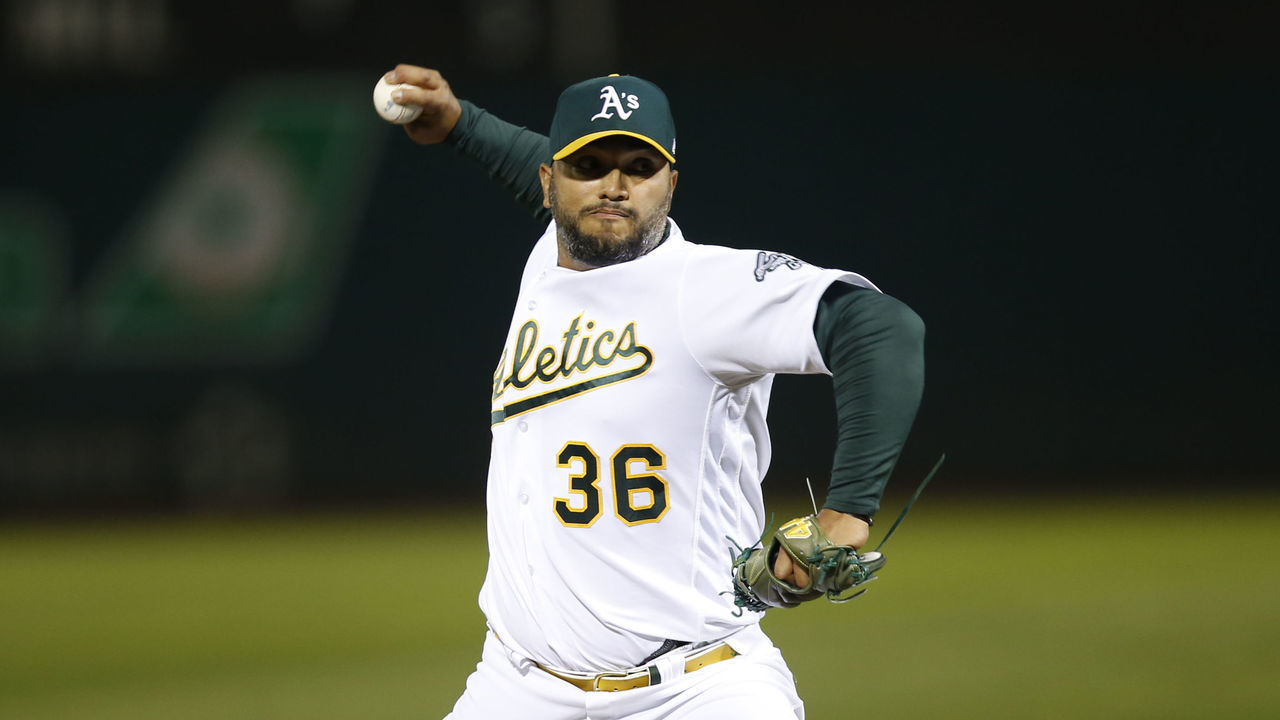 OAKLAND, CA - SEPTMEBER 24: Yusmeiro Petit #36 of the Oakland Athletics pitches during the game against the Houston Astros at RingCentral Coliseum on September 24, 2021 in Oakland, California. The Athletics defeated the Astros 14-2.