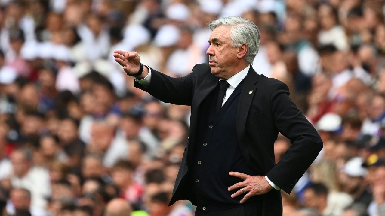 Real Madrid's Italian coach Carlo Ancelotti gestures during the Spanish League football match between Real Madrid CF and RCD Espanyol at the Santiago Bernabeu stadium in Madrid on April 30, 2022.