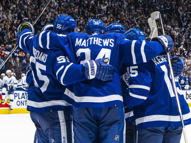 TORONTO, ON - MAY 2: Auston Matthews #34 of the Toronto Maple Leafs celebrates his second goal of the night against the Tampa Bay Lightning with teammates Mark Giordano #55 and Alex Kerfoot during the third period in Game One of the First Round of the 2022 Stanley Cup Playoffs at the Scotiabank Arena on May 2, 2022 in Toronto, Ontario, Canada.
