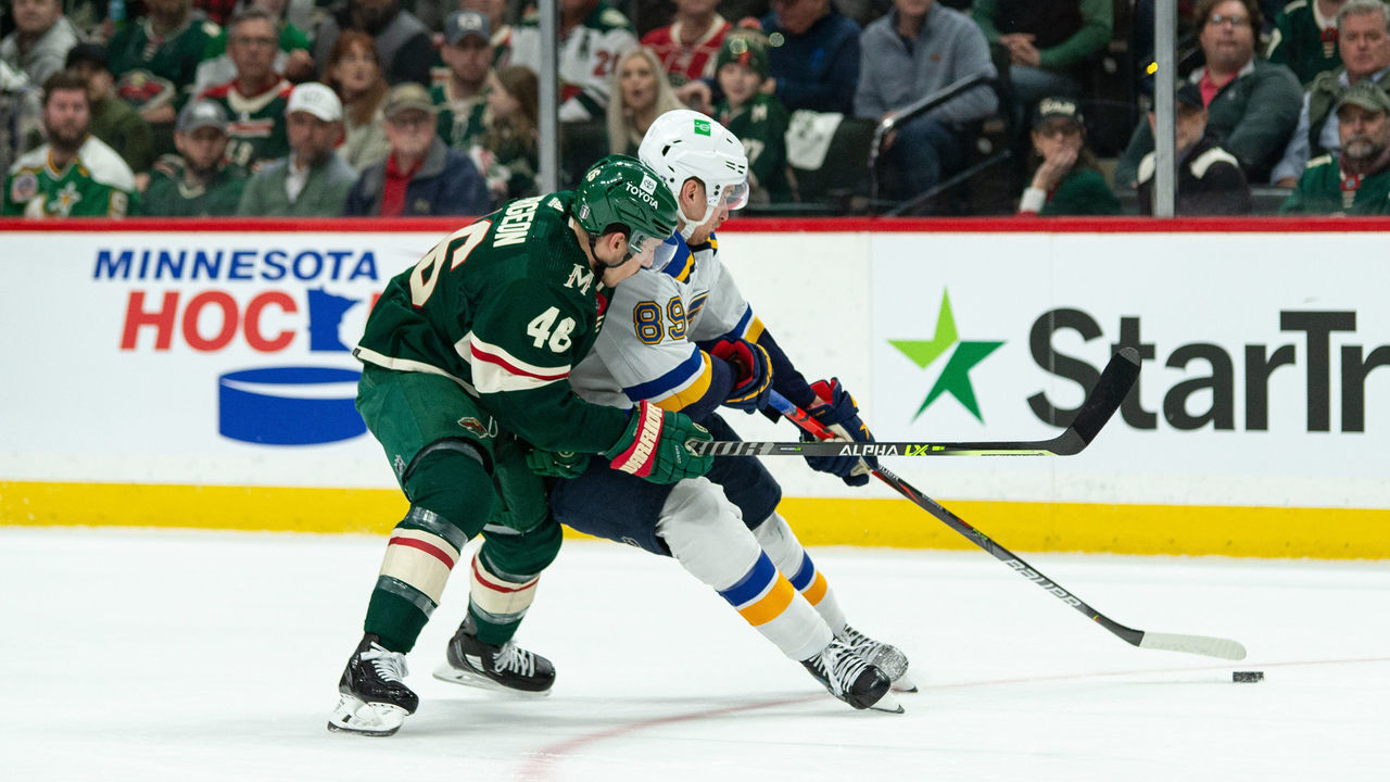 SAINT PAUL, MN - MAY 02: Minnesota Wild Defenceman Jared Spurgeon (46) attempts to bump St. Louis Blues Winger Pavel Buchnevich (89) off the puck during game 1 of the NHL playoffs between the St. Louis Blues and the Minnesota Wild on April May 2nd, 2022, at Xcel Energy Center in Saint Paul, MN.